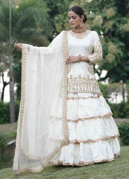 Cream White And Subtle Gold Embroidered Lehnga