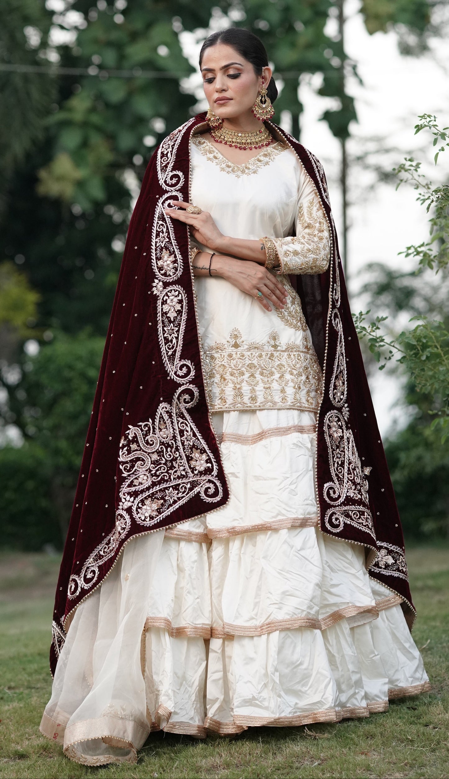 Cream White And Subtle Gold Embroidered Lehnga
