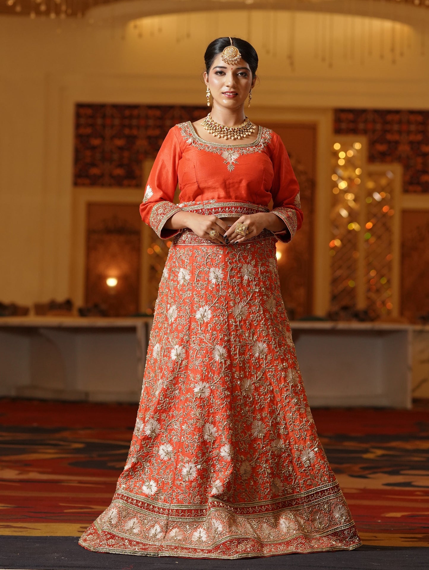 Sunset Orange Lehenga with Heavy Gold Work