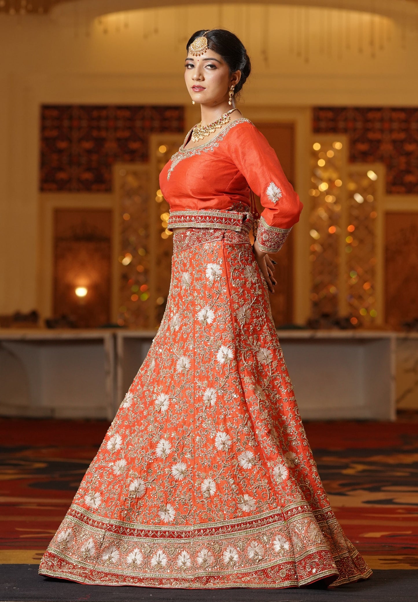 Sunset Orange Lehenga with Heavy Gold Work