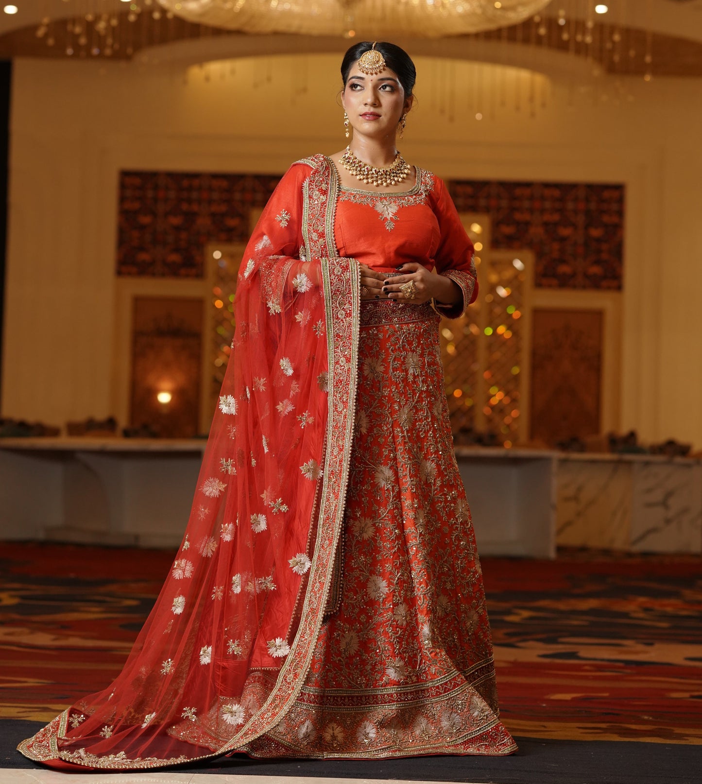 Sunset Orange Lehenga with Heavy Gold Work