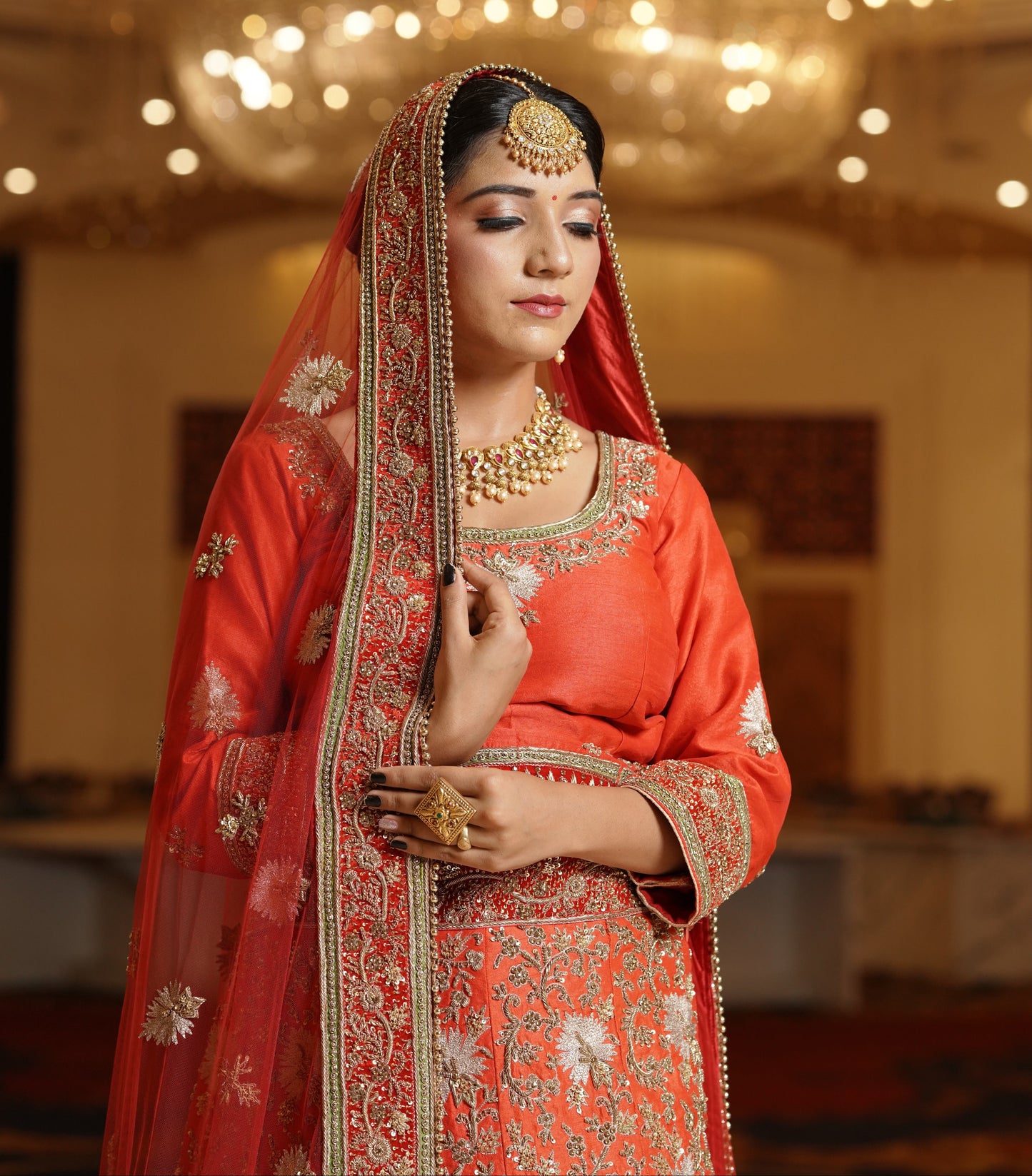 Sunset Orange Lehenga with Heavy Gold Work