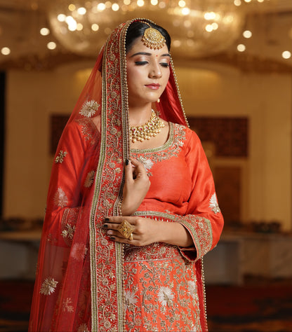 Sunset Orange Lehenga with Heavy Gold Work